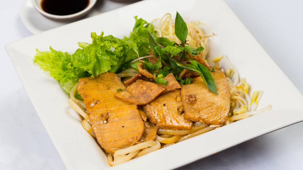 A bowl of traditional Cao Lau noodles in Hoi An