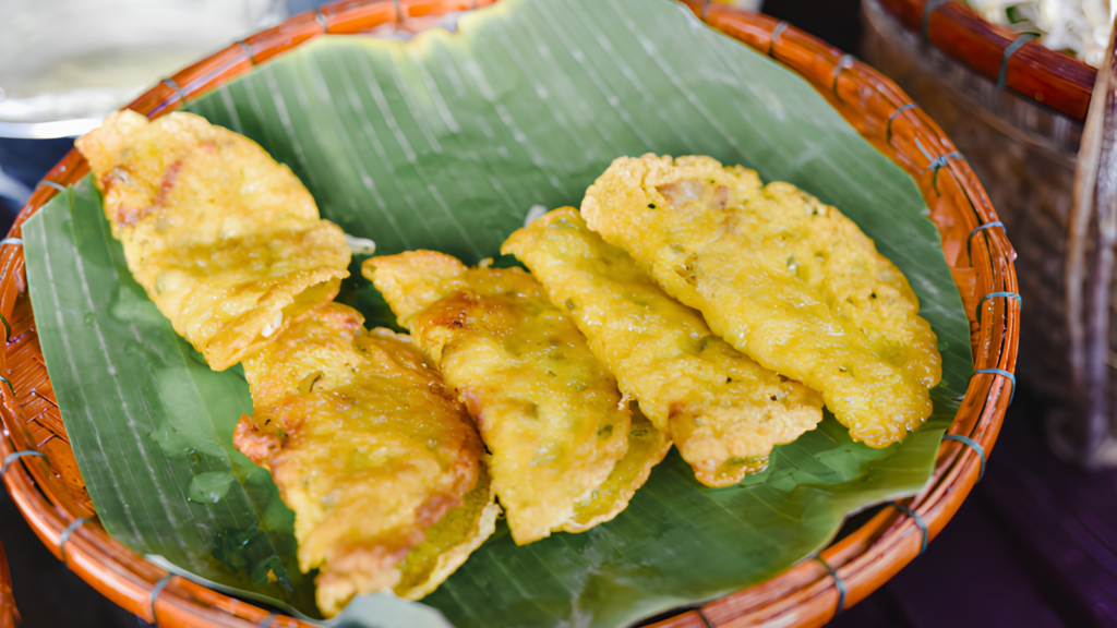 Hoi An crispy pancake with fresh Tra Que herbs