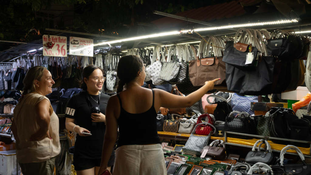 Shopping for bag at Hoi An Night Market