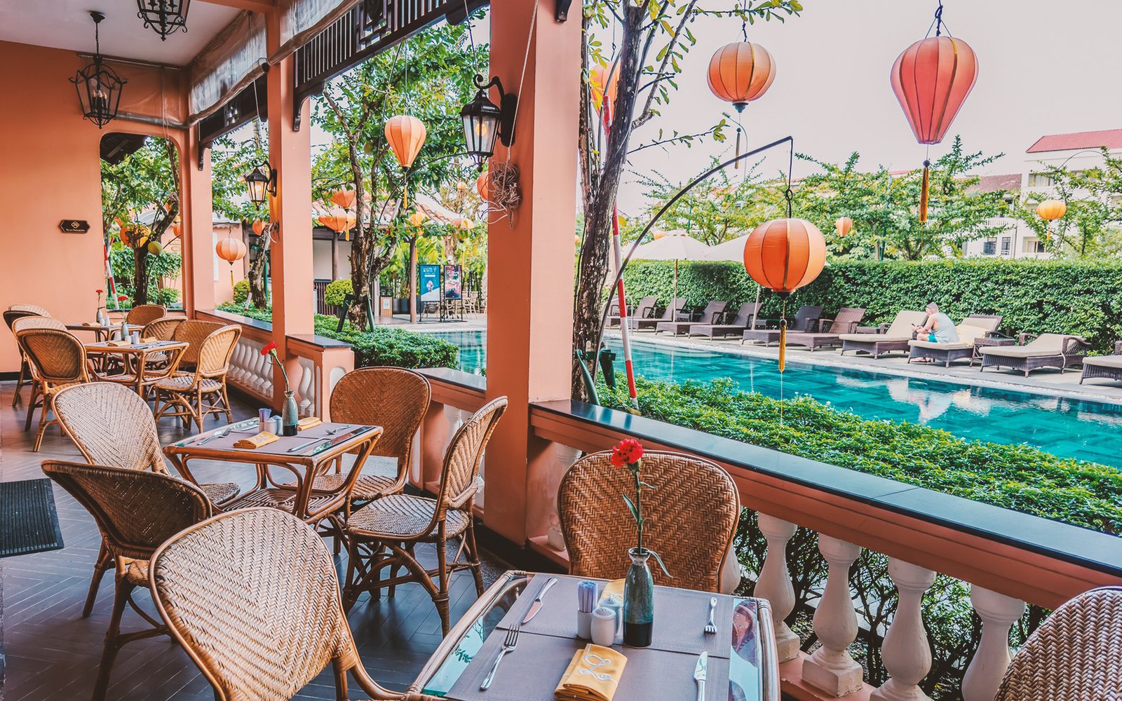 Allegro Hoi An restaurant overlooking the lantern-lit pool