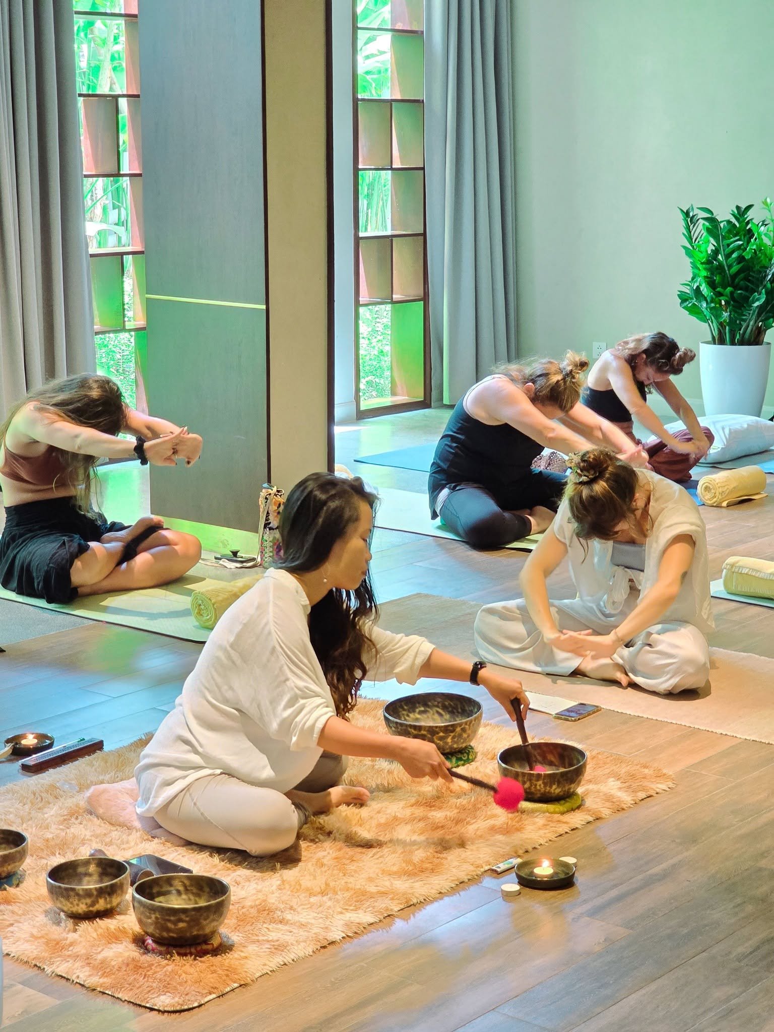 Guests taking part in a sound healing wellness session