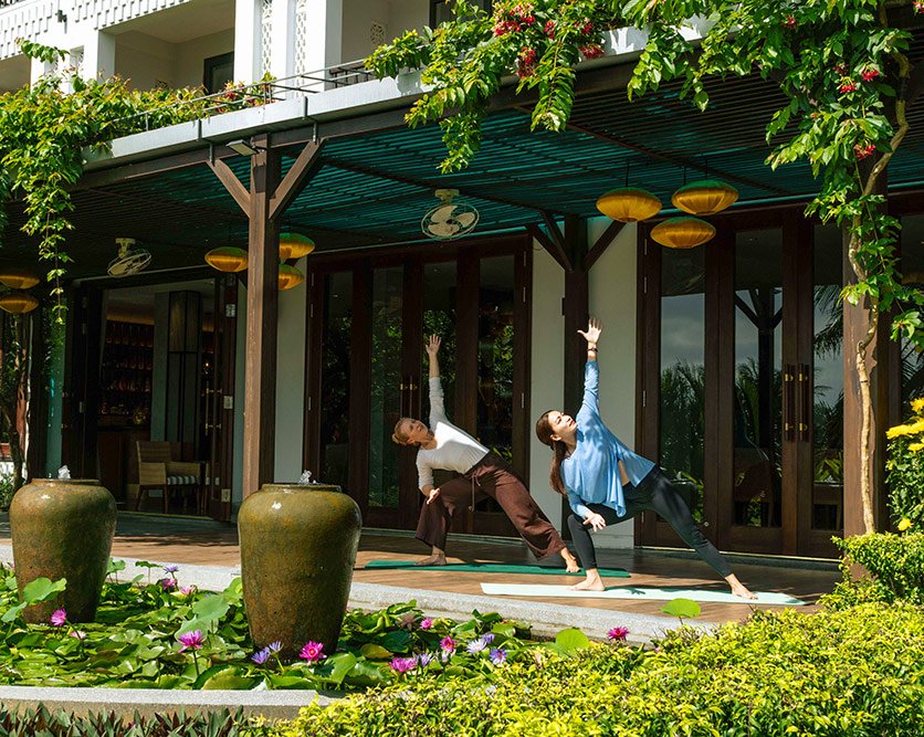 Yoga beside the lotus pond at Little Oasis