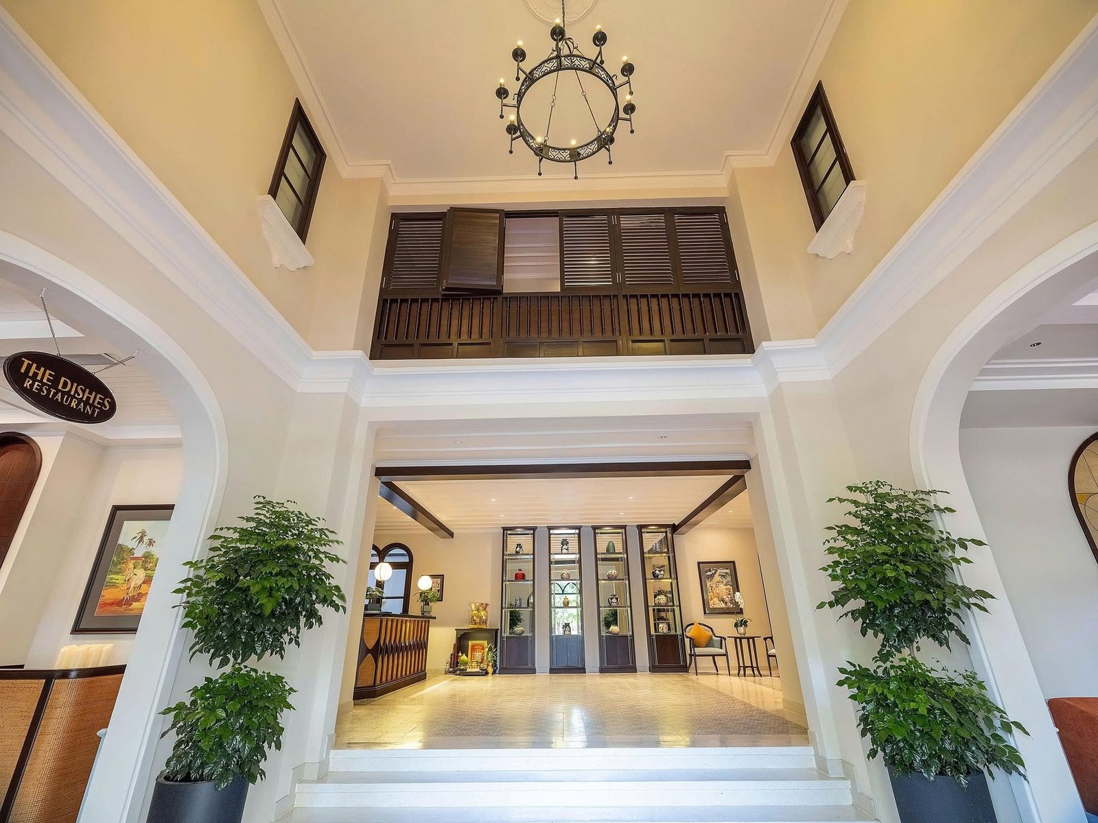 The bright heritage lobby at Little Residence Hoi An