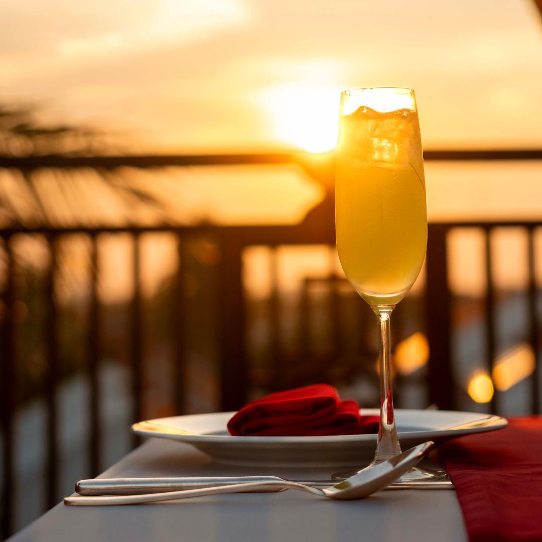 Cocktail served at sunset beside the river