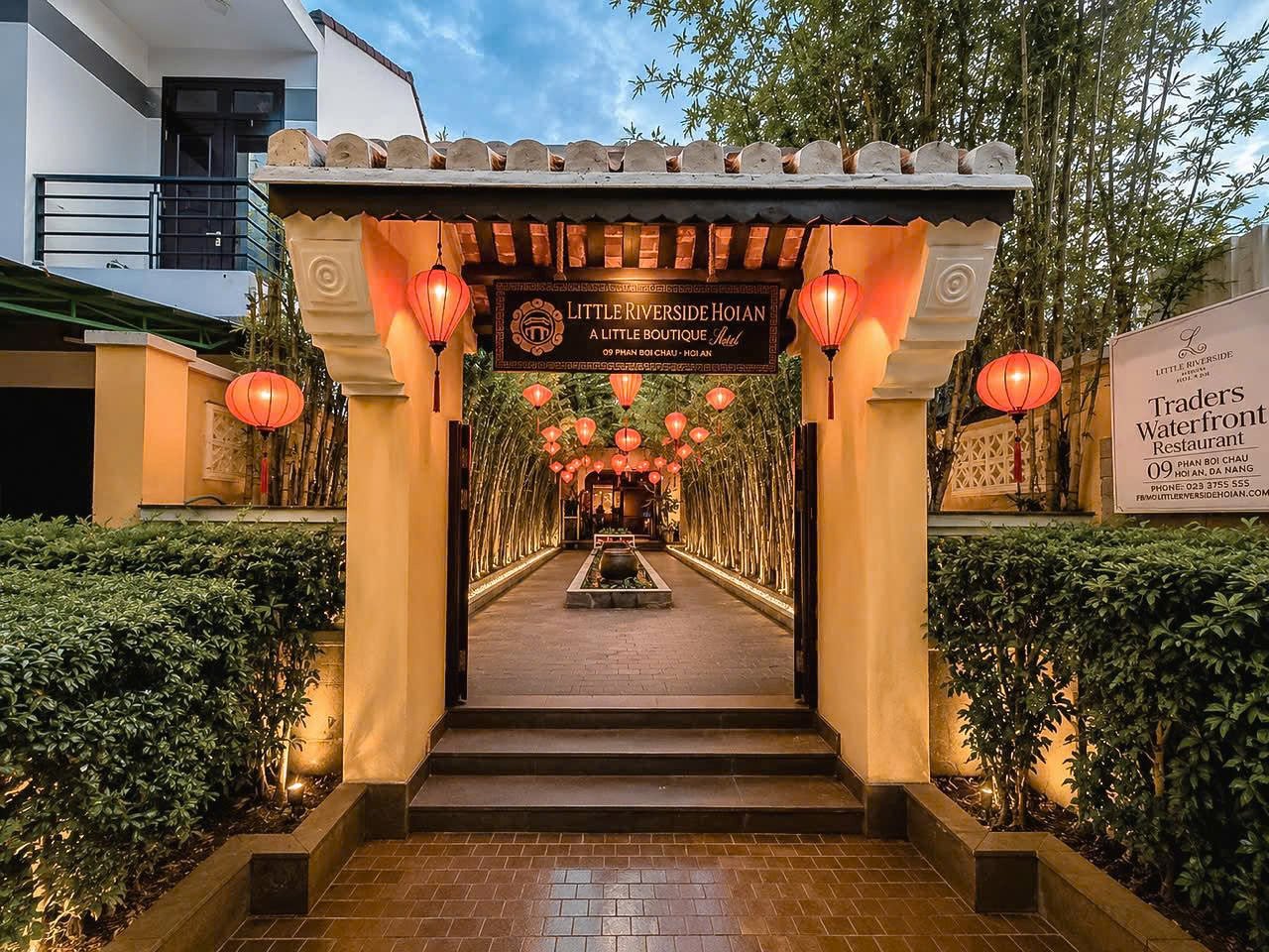 Lantern-lit bamboo entrance to Little Riverside Hoi An