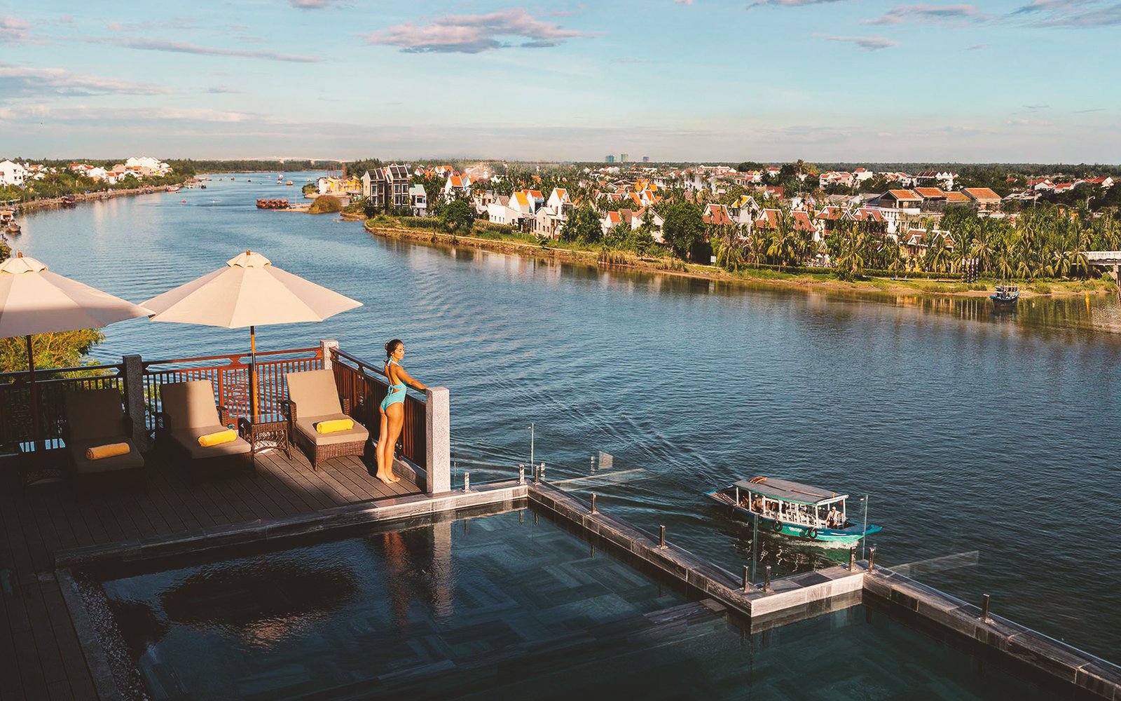 Rooftop infinity pool terrace overlooking the Thu Bon River